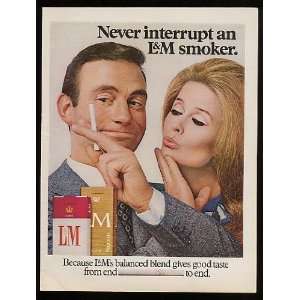  1968 Never Interrupt an L&M Cigarette Smoker Couple Print 