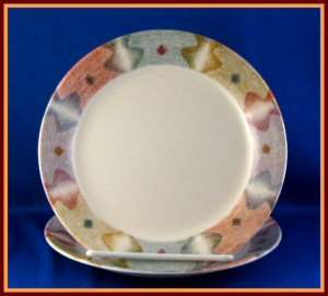   is mirage by corelle the pattern features a beige background and a