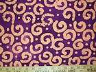 K122 Quilters Batik Orange Swirls on Purple Fabric BTY 
