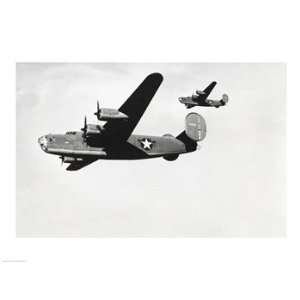  Low angle view of two bomber planes in flight, B 24 