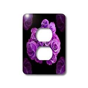   purple rose bouquet surrounded by four roses on black background