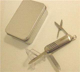 BENCHMARK PEN KNIFE WITH SCISSORS AND FILE WITH GIFT TIN.  