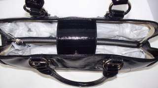 Handbag made of DKNY synthetic Patent leather and DKNY signature 