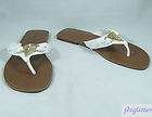 more options guess white with gold logo cely thong sandals