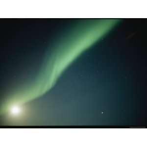  A Green Curtain of the Aurora Borealis in a Night Sky 