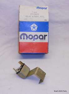 NOS MoPar 70 72 Dodge Charger Headlamp Door Relay/Brkt  