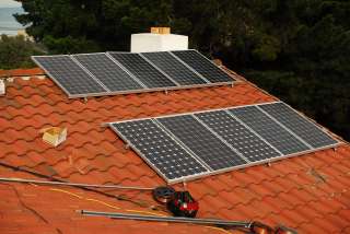 Solar panel mounting system for Spanish tile roof, for 2 full size 