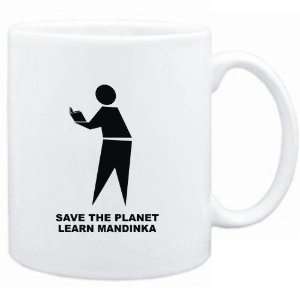 Mug White  save the planet learn Mandinka  Languages  