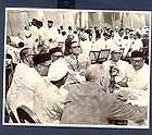 PEOPLE SITTING CHAIR FLOWER POT TABLE PHOTOGRAPH 1744