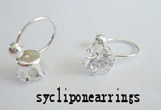 This is a list for one pair of clear white CZ earrings for non pierced 