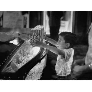  Boy Buying Popcorn at Movie Concession Stand Photographic 