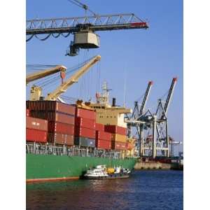  Crane Lifting Containers to and from Cargo Ship 