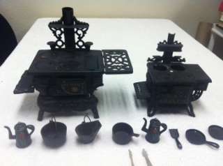 VINTAGE CAST IRON TOY STOVES 2 SETS WITH LOTS PIECES POTS PANS QUEEN 